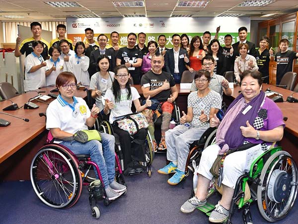 BCM charity event with wheelchair